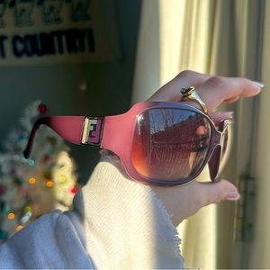 Purple fendi sun glasses. No scratches.